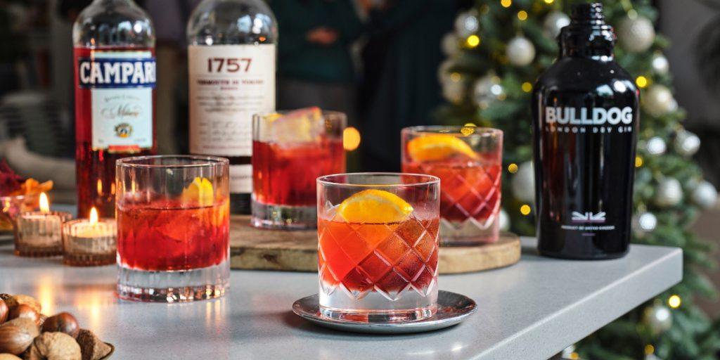 Negroni Cocktails with orange garnish made with Campari, Cinzano vermouth and Bulldog Gin