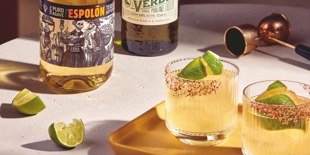Two Espolòn Spicy Margaritas with lime garnish
